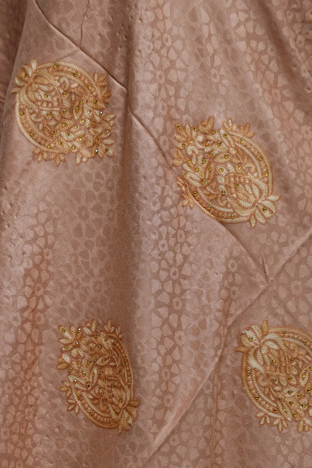 Fawn Colour Stole Enriched With Aari Embroidery And A Touch Of Swarovski Looks Wonderful.